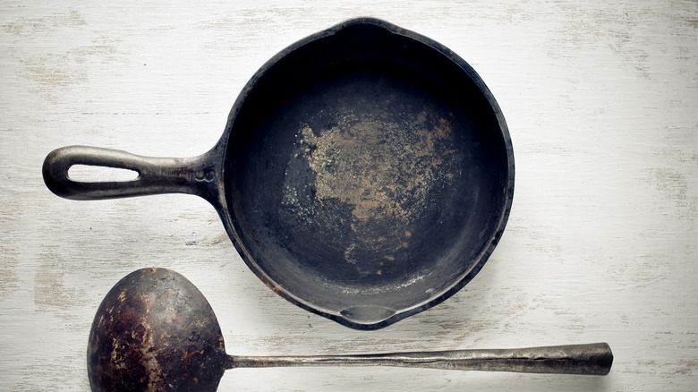 rusty cast iron pan