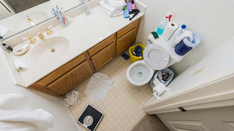 Cluttered bathroom that fails to use wall space for storage