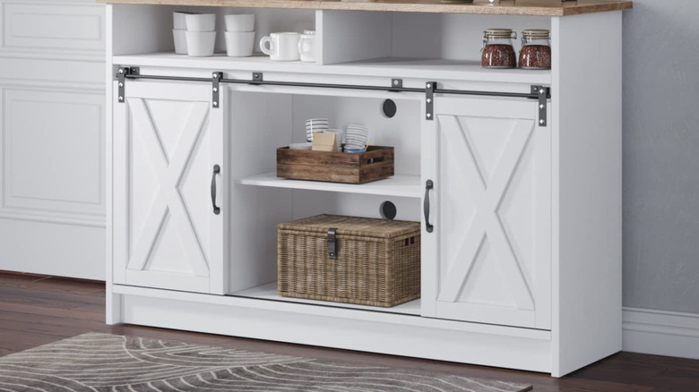 white cabinet with barn doors