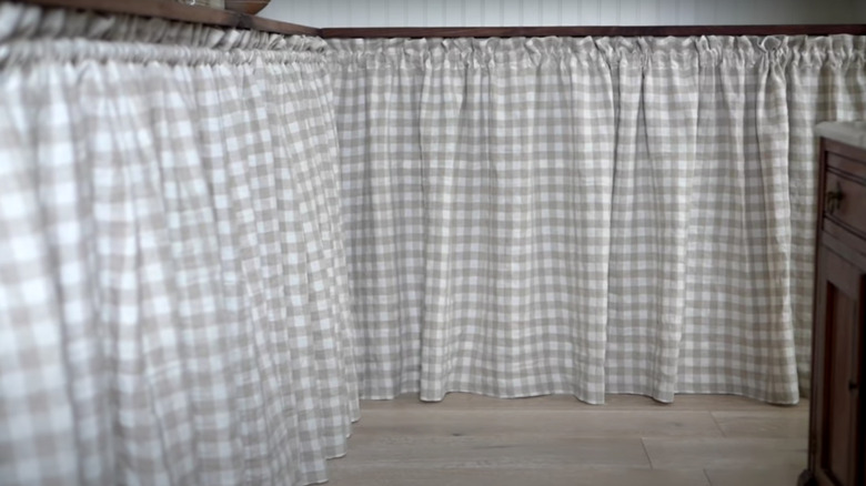 checkered cabinet curtains under countertop