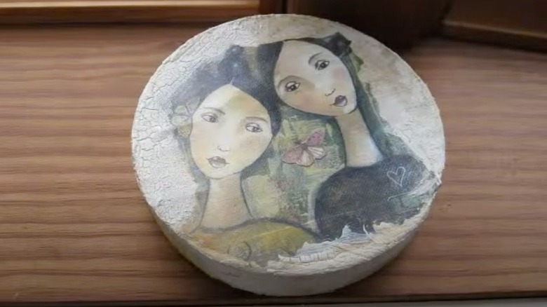 Decoupaged cheese box with folk art women's faces on lid