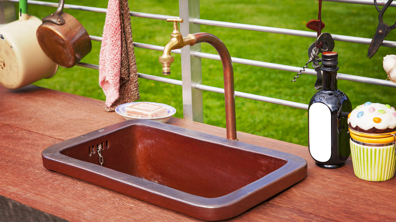 small outdoor rustic metal sink 