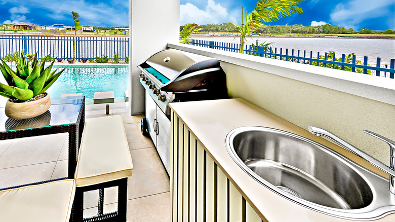 round sink near backyard pool