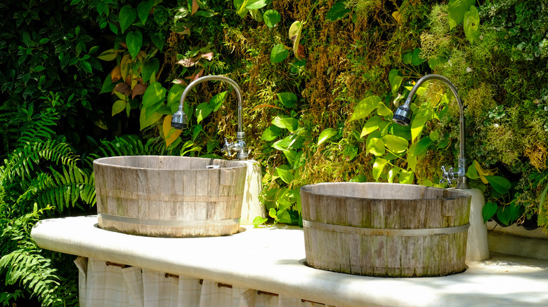 two wooden barrel sinks