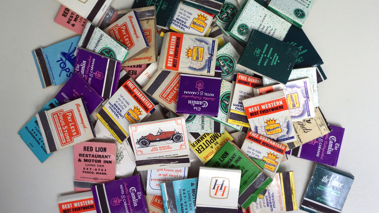 Pile of assorted colorful matchbooks