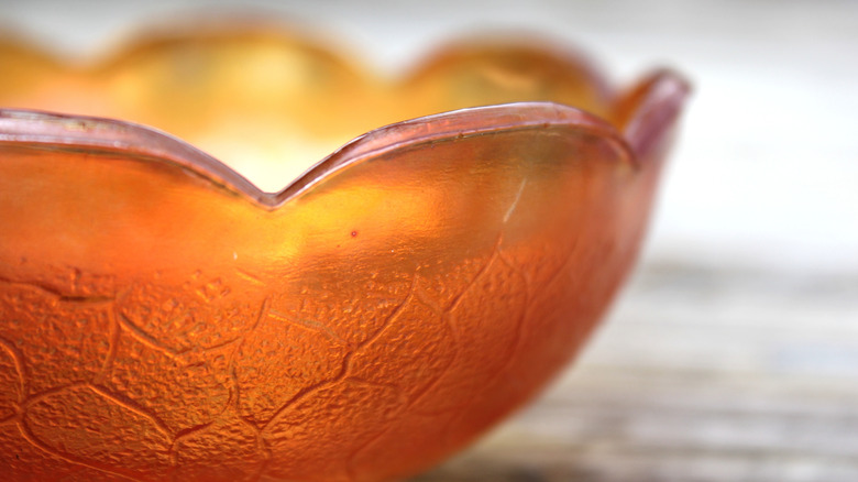 Closeup of vintage orange candy dish