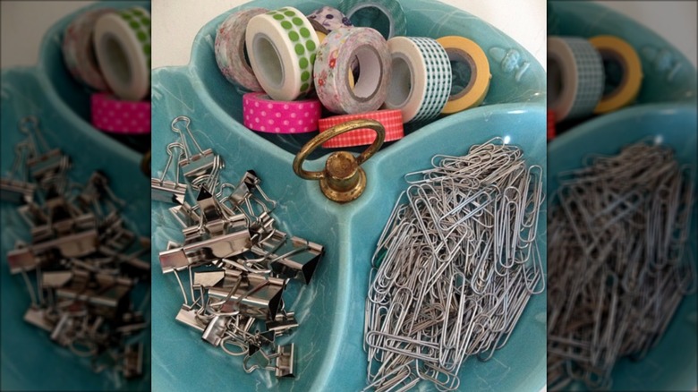 Clips and tape in vintage candy dish