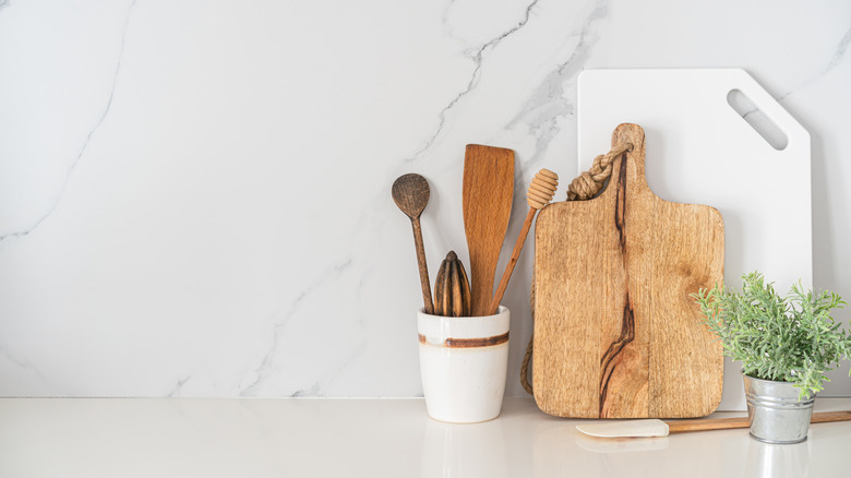 kitchen utensils in a small storage cup