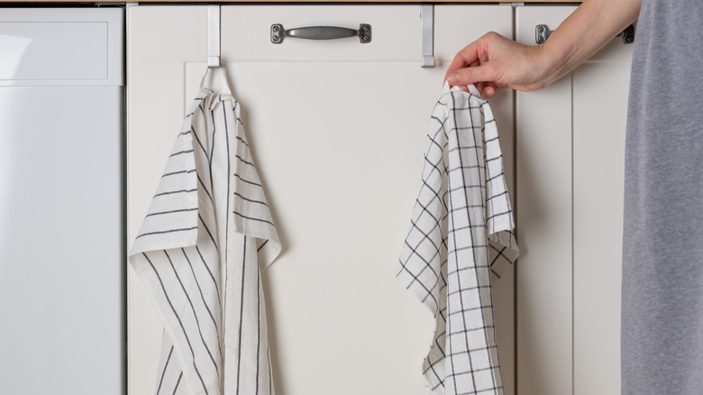 Kitchen towels hanging on hooks