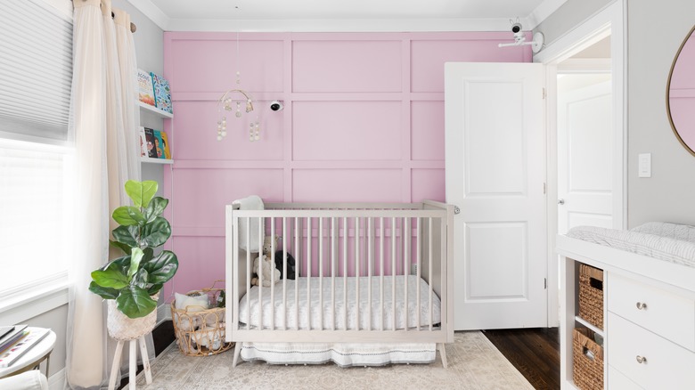 Pink wainscoting in nursery