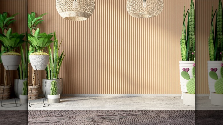 Neutral fluted accent wall with plants