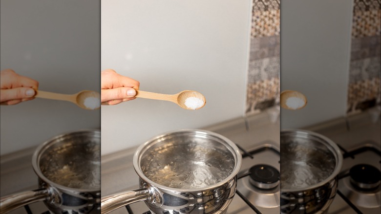 Adding salt to boiling water