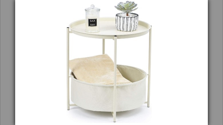 white nightstand with pillow storage