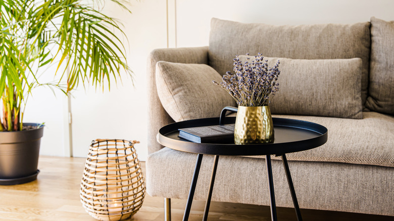 Round table in front of sofa