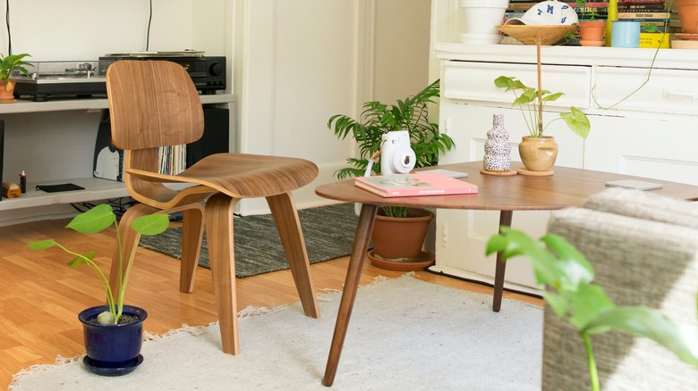 molded plywood chair in living room