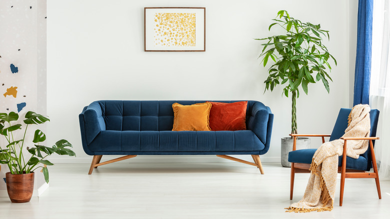 blue MCM couch and matching chair