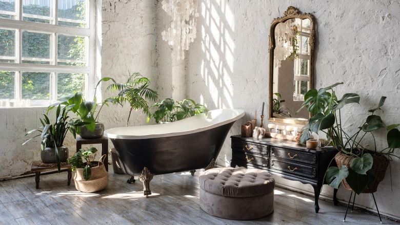 bohemian bathroom with clawfoot tub