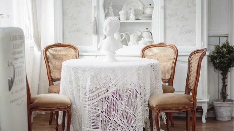 dining table with lace tablecloth