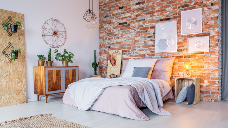 Brick wall industrial bedroom