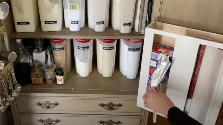 aluminum foil dispenser in cabinet