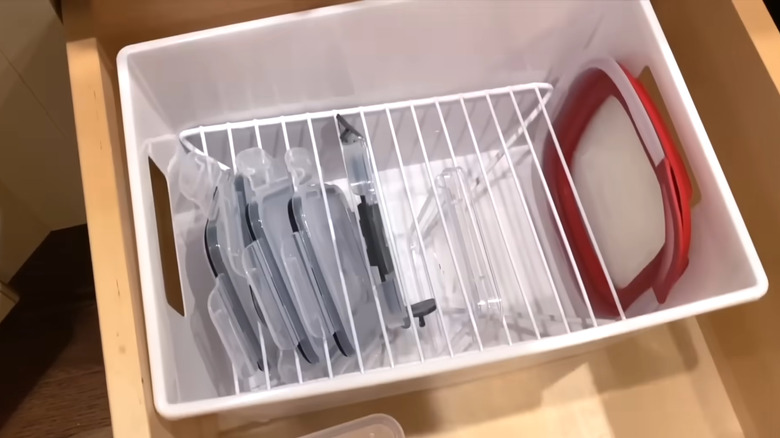 A lid organizer inside a basket