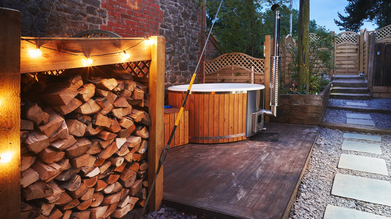 Secluded hot tub in backyard