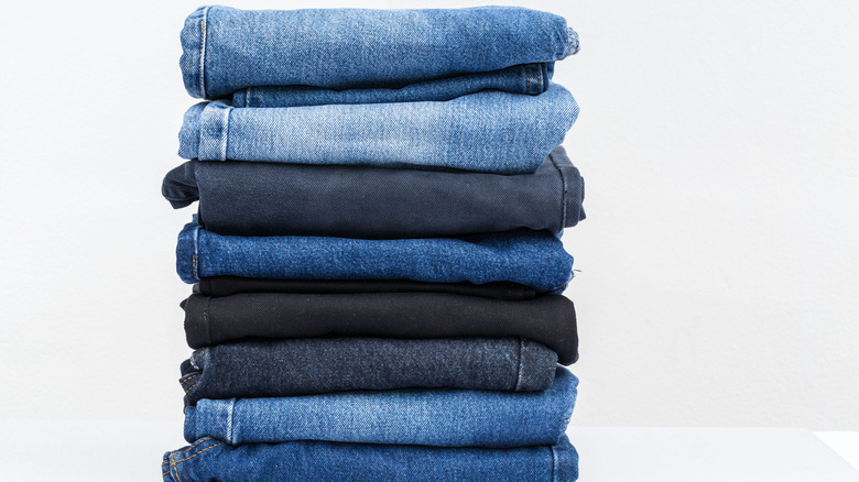 stack of blue jeans