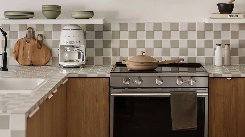 Checkered kitchen countertop tiles and backsplash