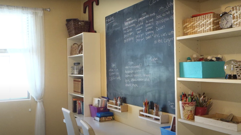 table against wall in classroom