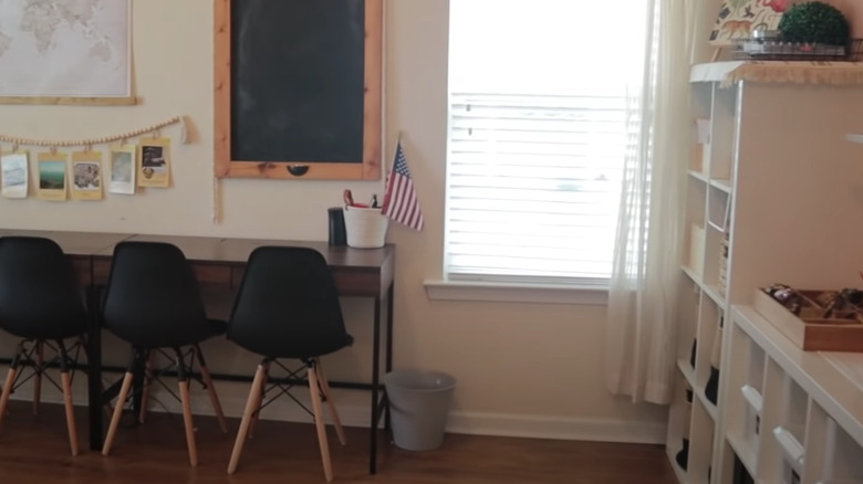 organized classroom with black chairs