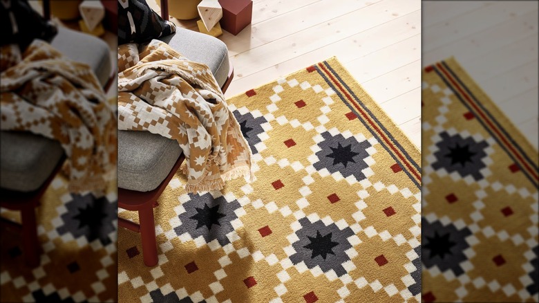 A brightly colored rug is displayed