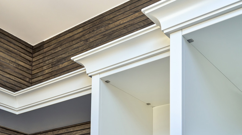 White cabinets with crown molding