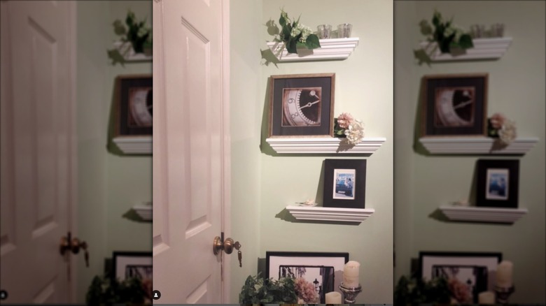 Crown molding shelving on wall