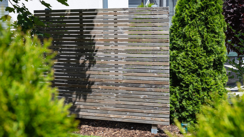 wooden privacy screen in garden