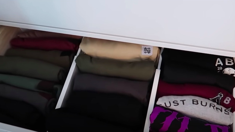 Folded clothes with dividers