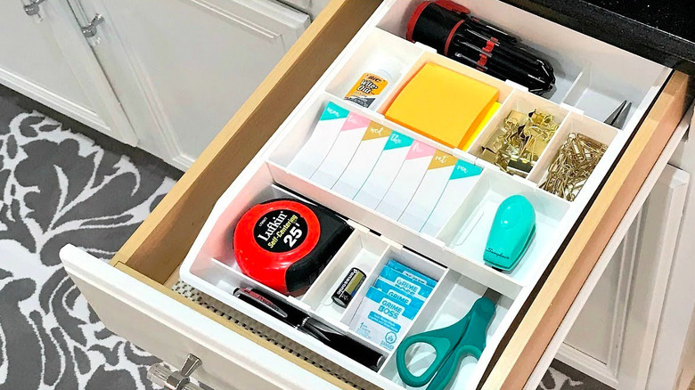 Tray organizer in junk drawer