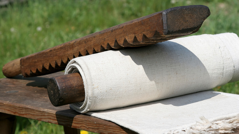 Using mangle board on a white clothing item