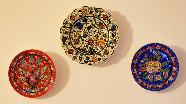 Plates arranged and hung on a wall