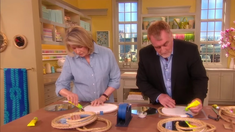 Martha Stewart gluing rope to a mirror