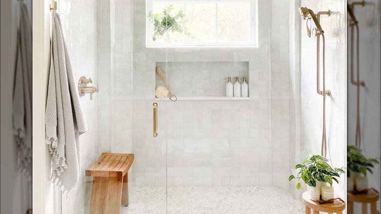 Spa-like shower with wooden bench