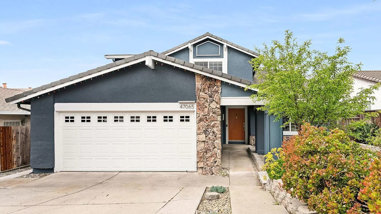 blue home with white trim