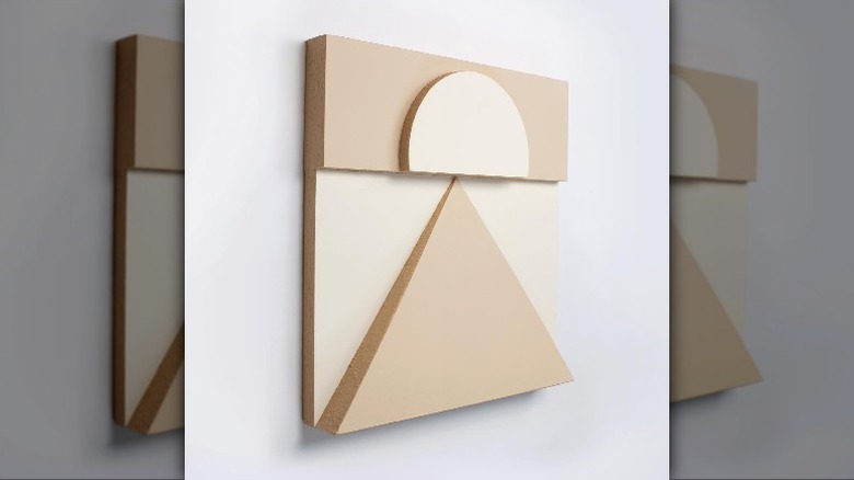 Minimalist sculpture on a wall