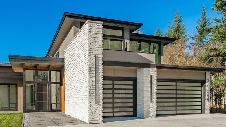 paneled garage doors with windows