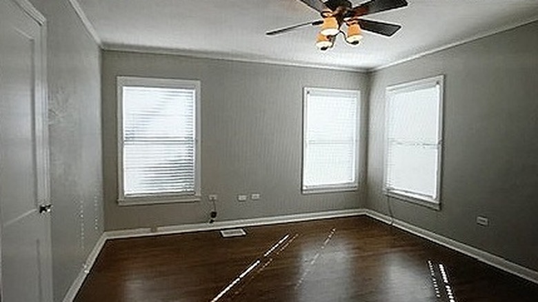 Gray room with hardwood floors