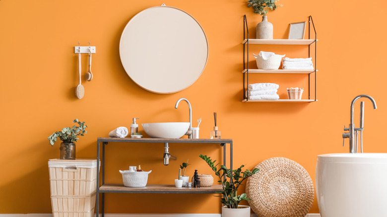 bathroom with orange walls