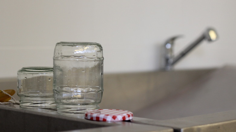 Clean jars drying on sink