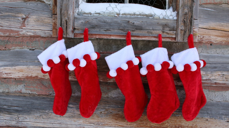 red stockings hanging from window