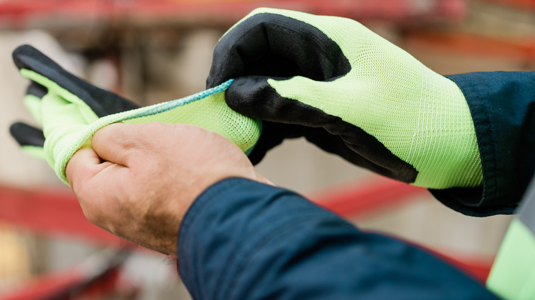 Person wearing gloves