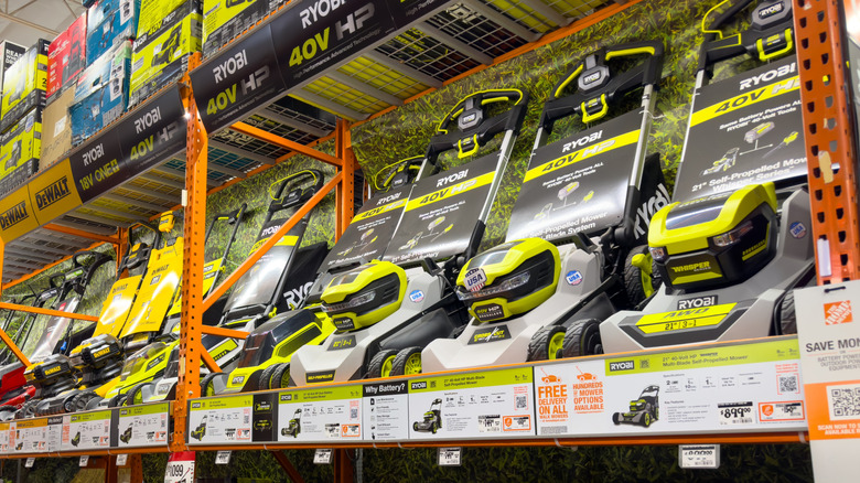 Selection of Ryobi mowers on store shelves