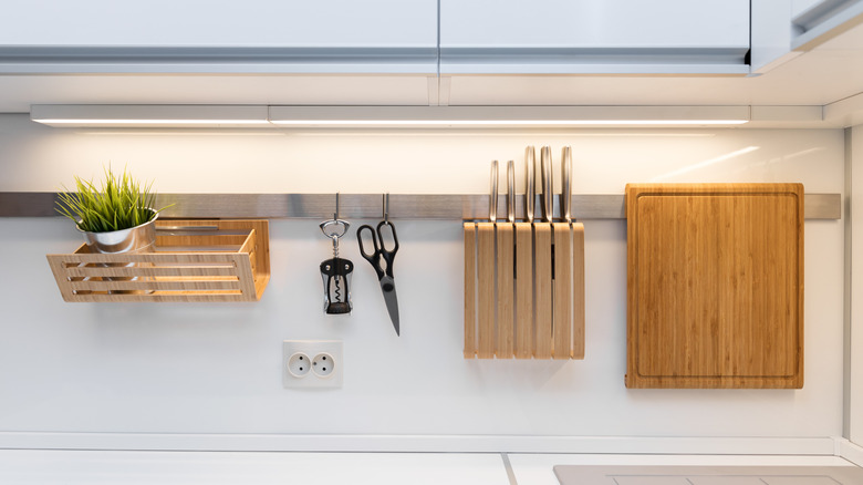 Kitchen items hung on wall